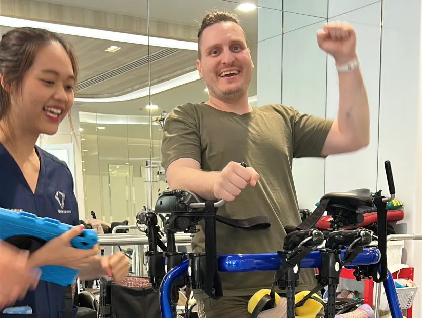 Patient Story Profile Picture - Vuk celebrating progress during a rehabilitation session at Verita Neuro